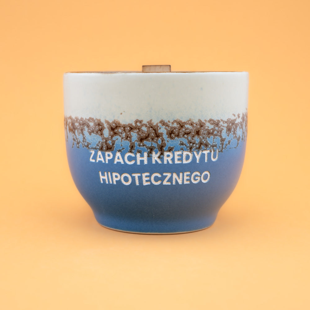 Świeca sojowa „Zapach kredytu hipotecznego” (Milo)